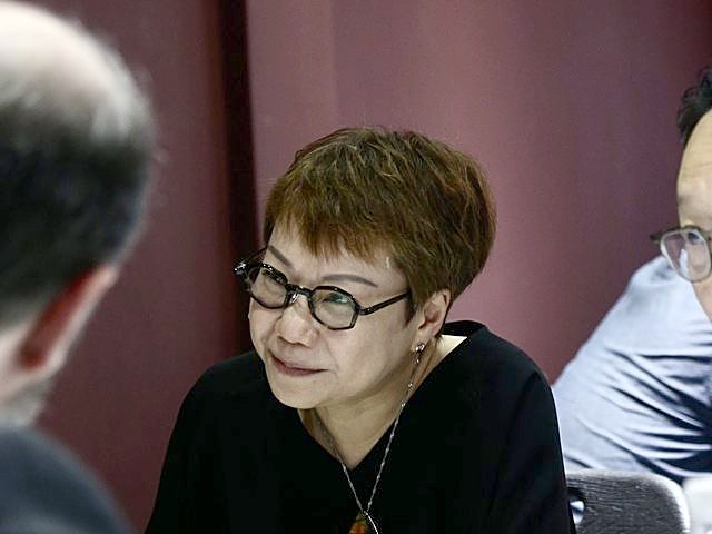 Sandra Fung listening during a coaching conversation